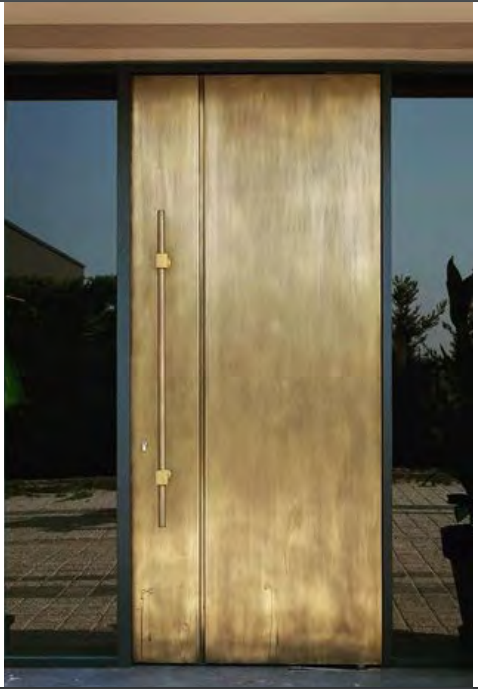 THE SMOOTH BRASS DOOR