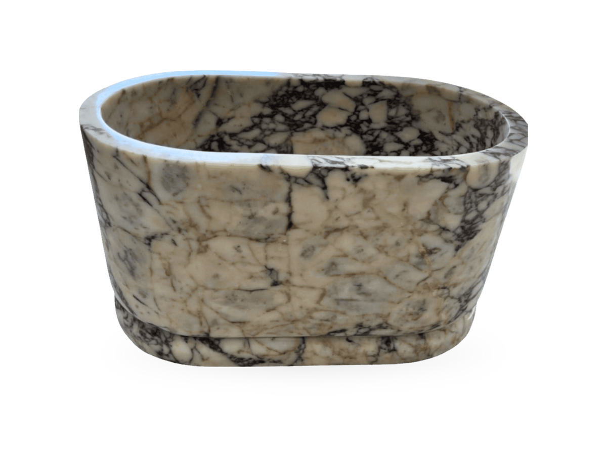 The Calacatta Viola Soaking Bathtub, hand-carved marble